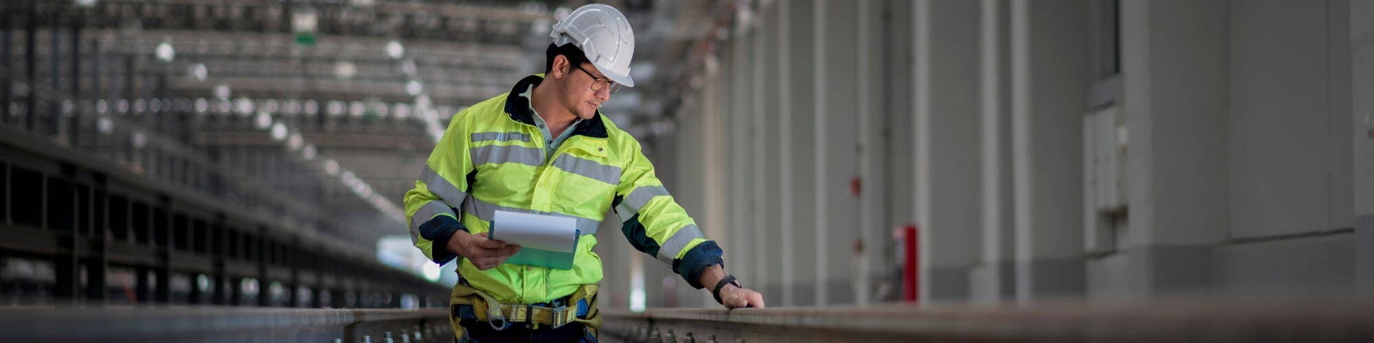 Engineering project manager checking rail track 